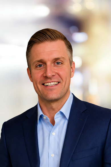 Portrait of Aidan Jones, REALTOR®.
